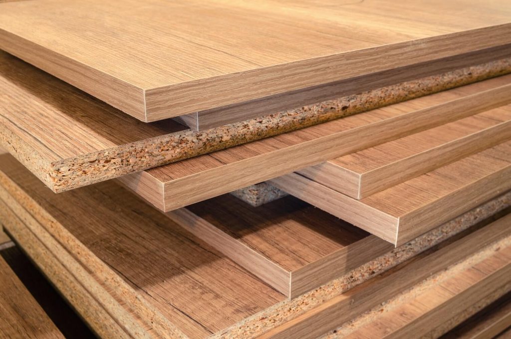 an image with various types of wood including MDF, particle board, and plywood